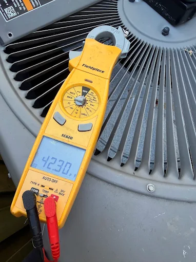 AC maintenance amperage check